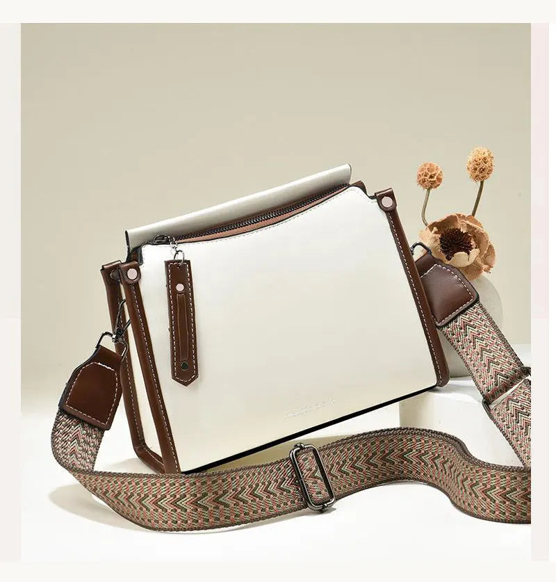 Elevate your style with this luxury designer crossbody bag for women, featuring a fashionable and chic color. Perfect for adding a touch of sophistication to your ensemble! -