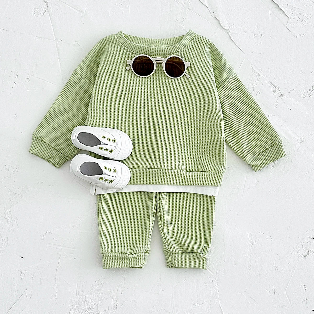 Dress your little one in comfort with this new baby clothes set—featuring a loose waffle cotton tracksuit perfect for kids on the move 0-3 Years Old -