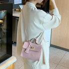 This set of women's bags combines both style and functionality with a blend of elegant messenger and handbag designs. Perfect for carrying your essentials stylishly and efficiently, this set offers the best of both worlds in one chic collection. -