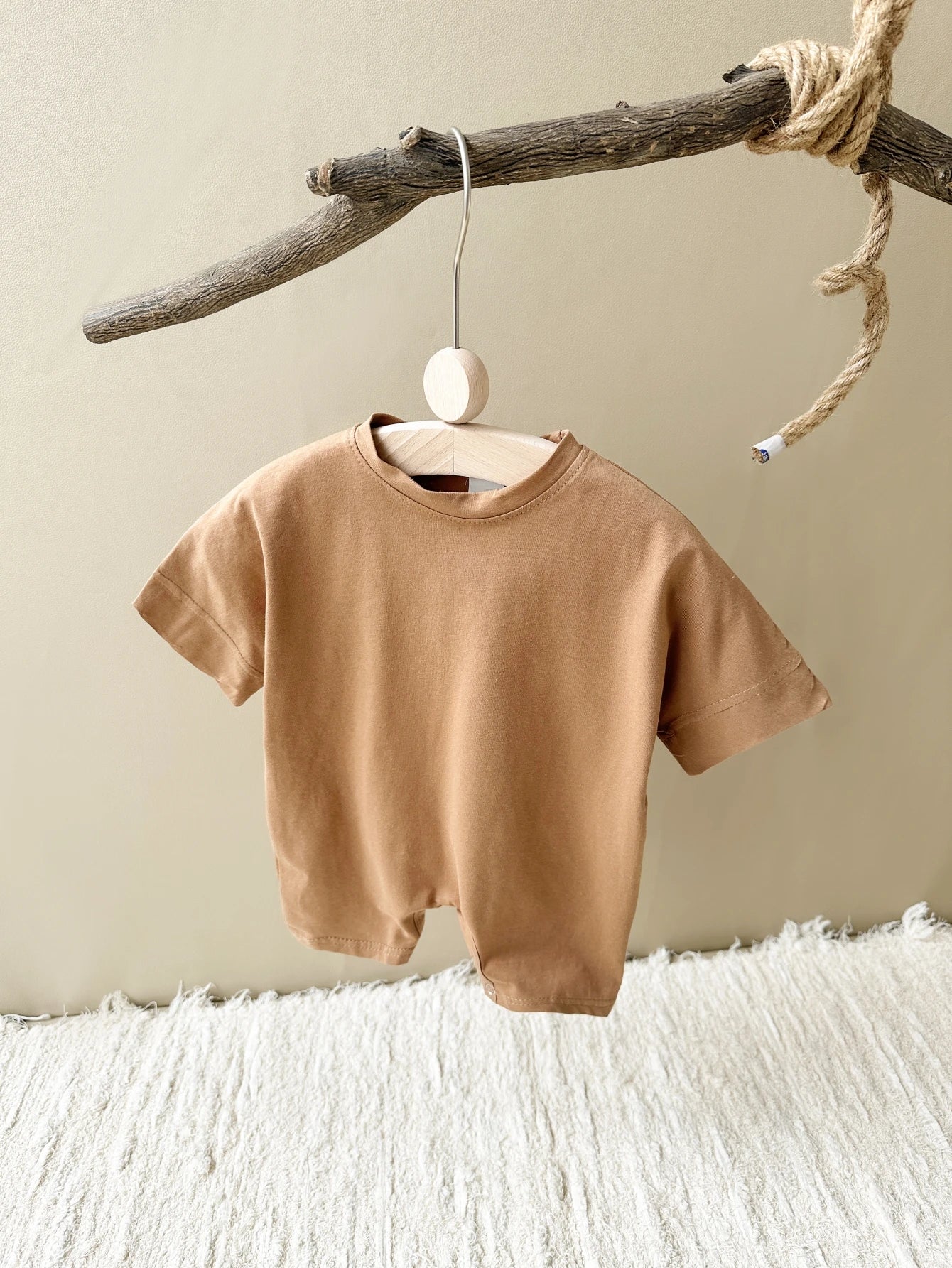 Keep your baby boy comfy and cute with this basic romper, perfect for ages 0-1 year! -