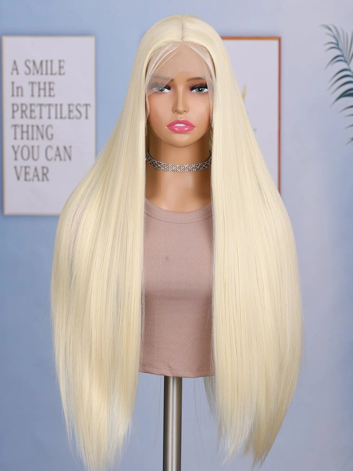 Enhance your style with this 24-inch straight lace front wig. Featuring a sleek black color, this wig is suitable for daily wear, providing a stylish and effortless look. -