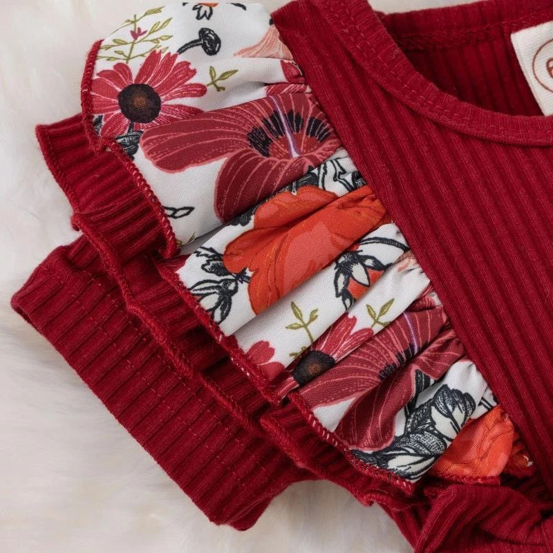 Dress your baby girl in adorable comfort with this striped cotton jumpsuit featuring a sweet bowknot—perfect for newborns! -