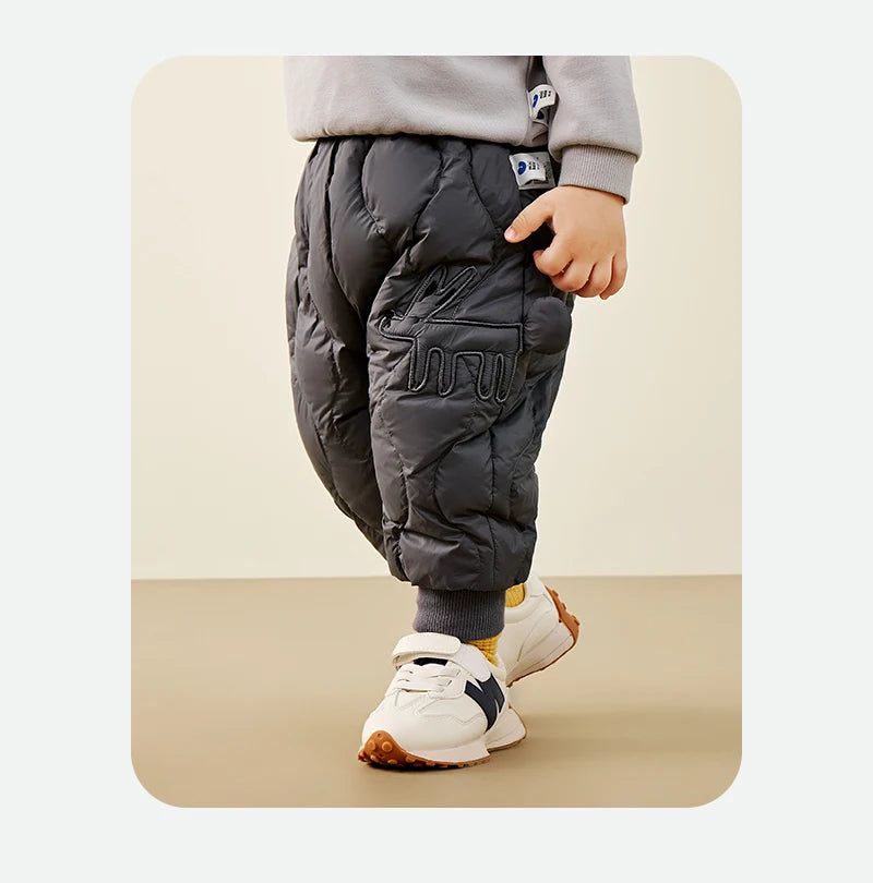 Keep your kids cozy and protected with these new style three-proof high-waisted warm down trousers—perfect for boys and girls on chilly days! -