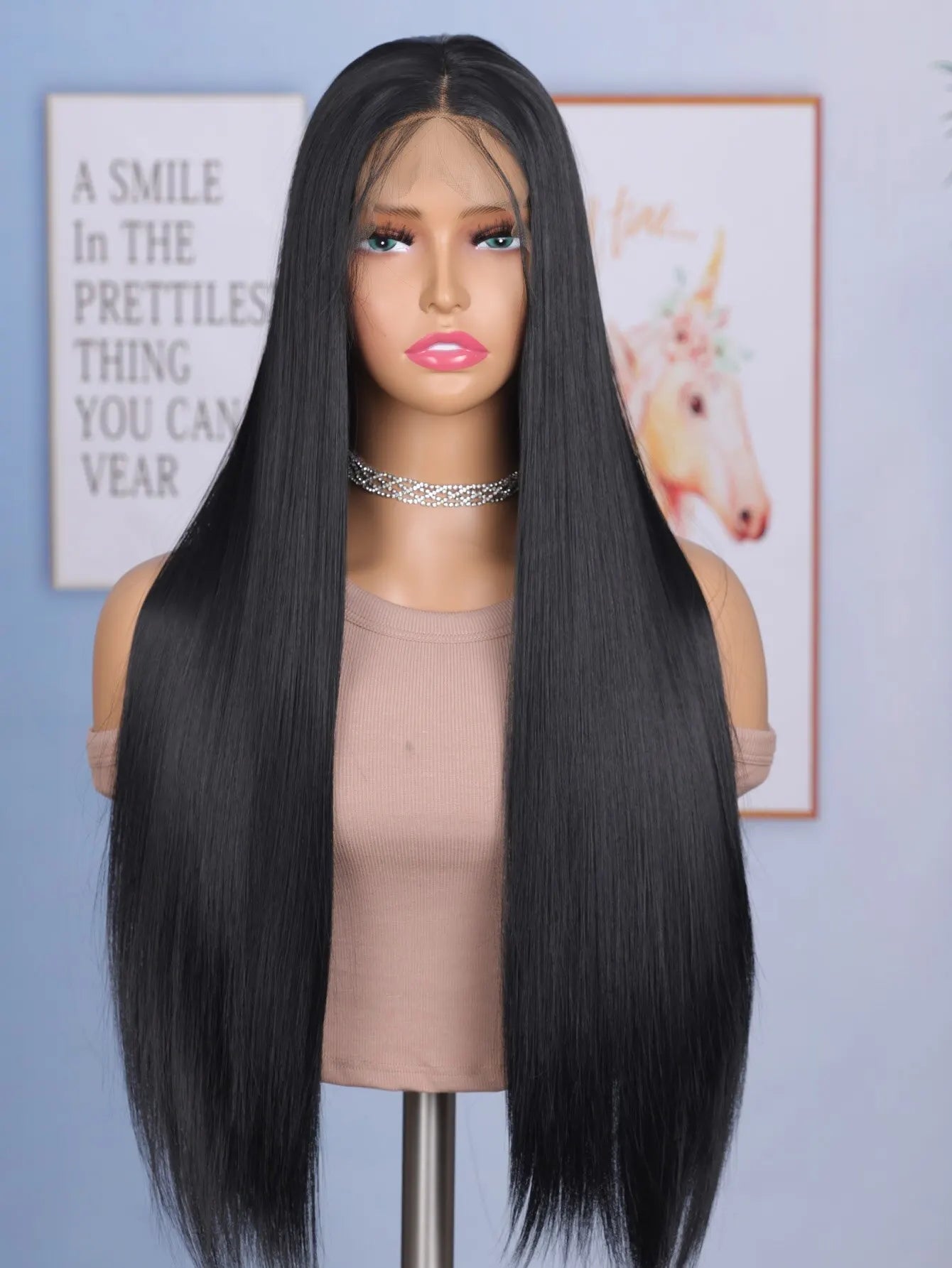 Enhance your style with this 24-inch straight lace front wig. Featuring a sleek black color, this wig is suitable for daily wear, providing a stylish and effortless look. -