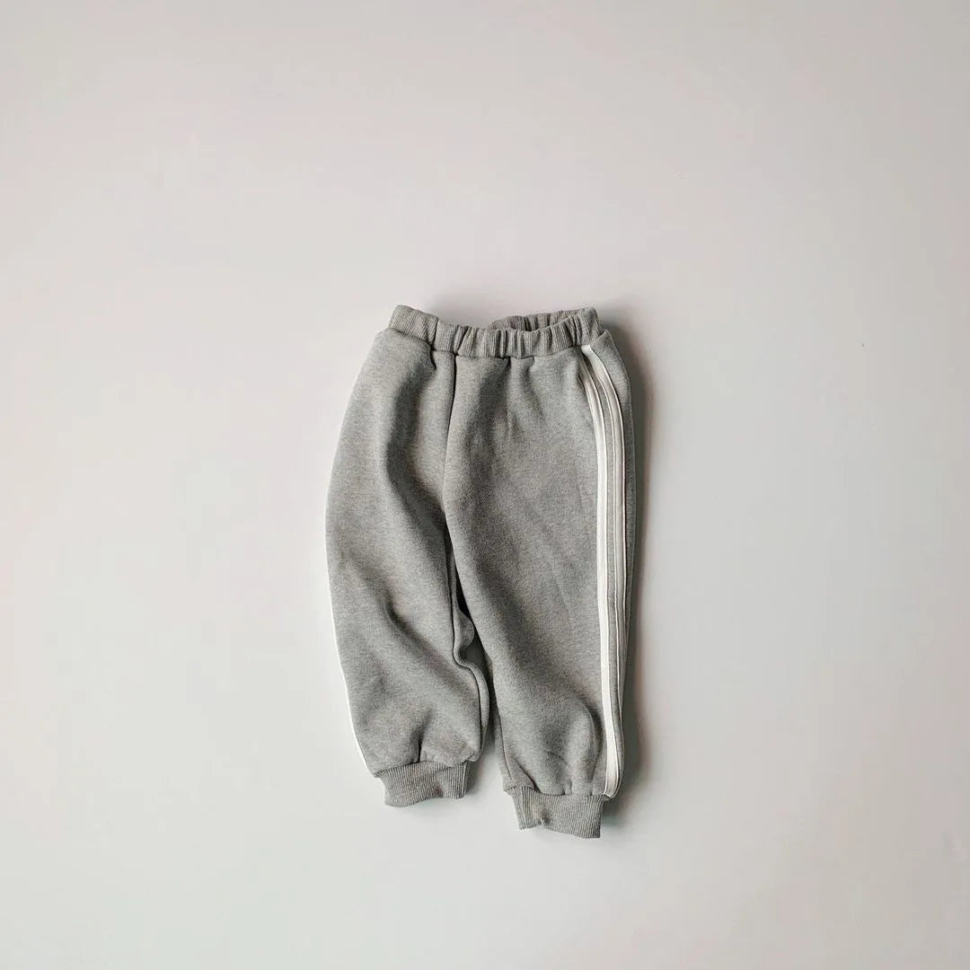 Keep your little one stylish and comfy with this cool two-piece baby suit—featuring a letter-printed zip-up top and matching leisure sports pants! -