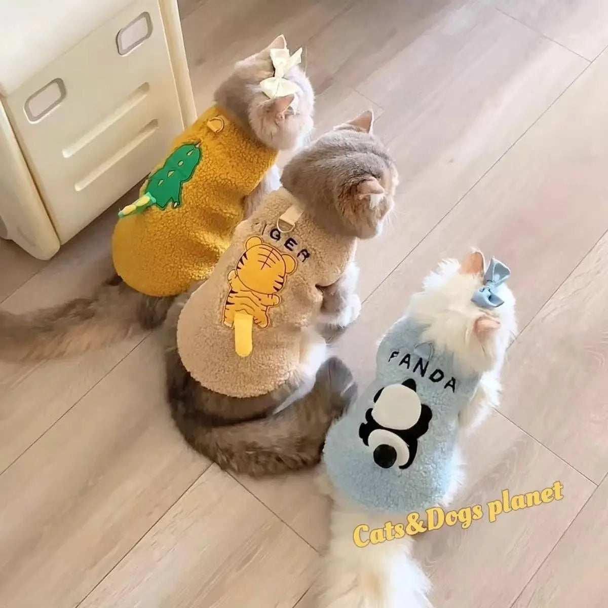 Keep your small and medium-sized dogs, as well as cats, stylish in these adorable pet clothes—perfect for adding flair to your furry friends' wardrobes! -