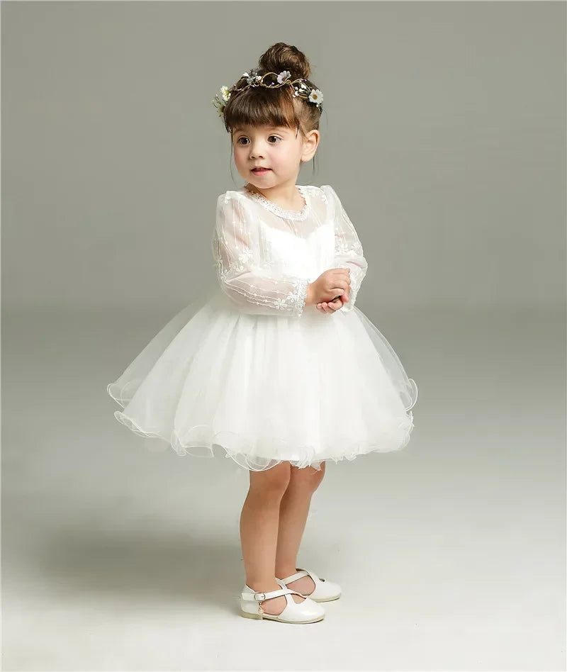 Make your baby girl shine in this elegant long-sleeve white party dress—perfect for special occasions! -