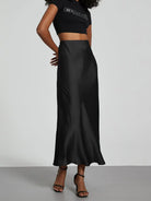 Elevate your elegance with this sleek black satin skirt for women—perfect for any occasion! -