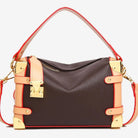 Make a statement with this luxurious and elegant box bag for women. Crafted from high-quality leather, this shoulder handbag features an elegant top-handle design, exuding sophistication and style for a classy finishing touch to your ensemble. -