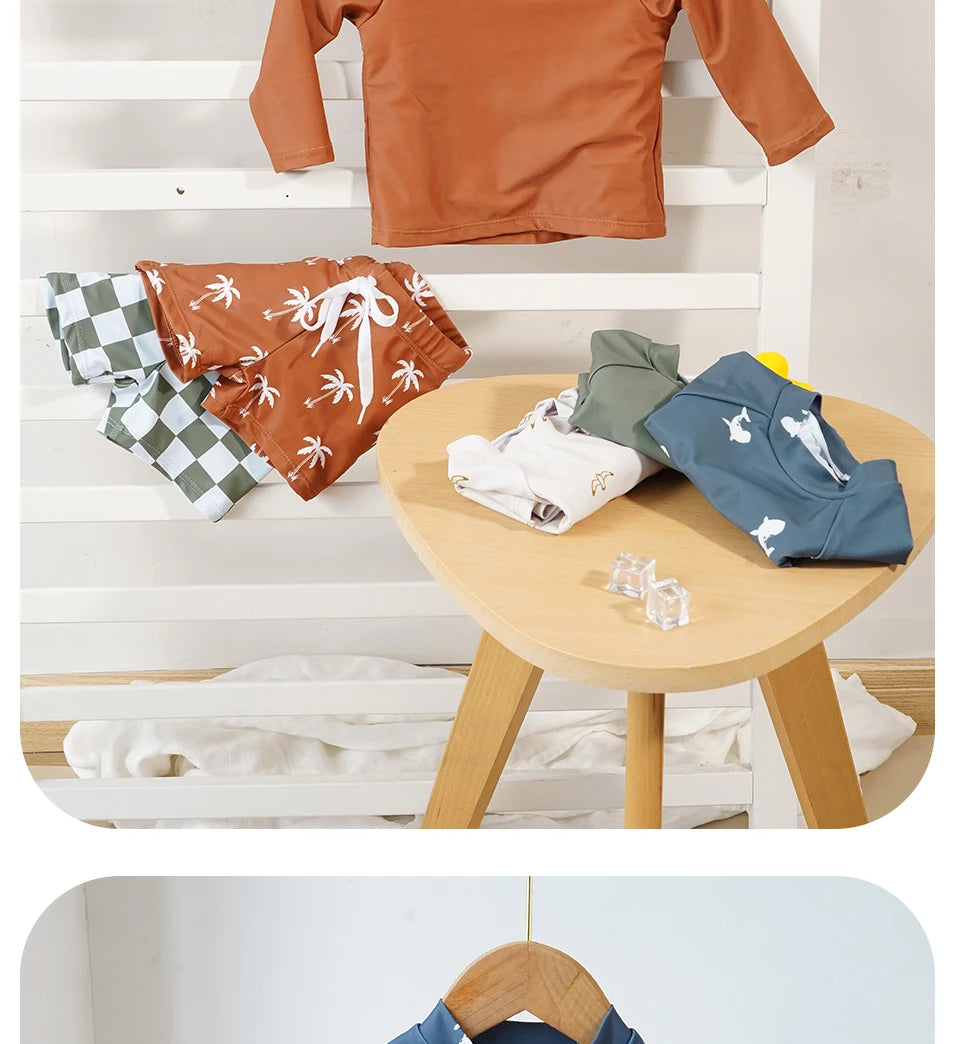 Make a splash in style with this fashionable and cute long-sleeve swimsuit for baby boys and girls—perfect for pool days and swim fun! -