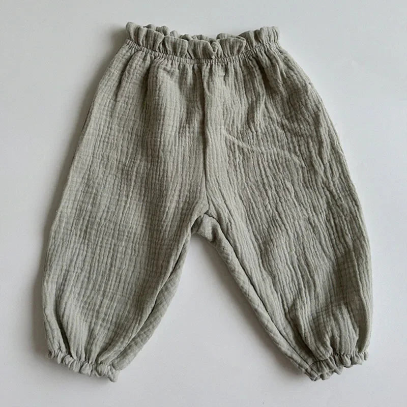 Keep your little ones comfy and cute in these organic cotton loose-fit baby pants—featuring playful tiger, bear, and floral prints perfect for boys and girls! -