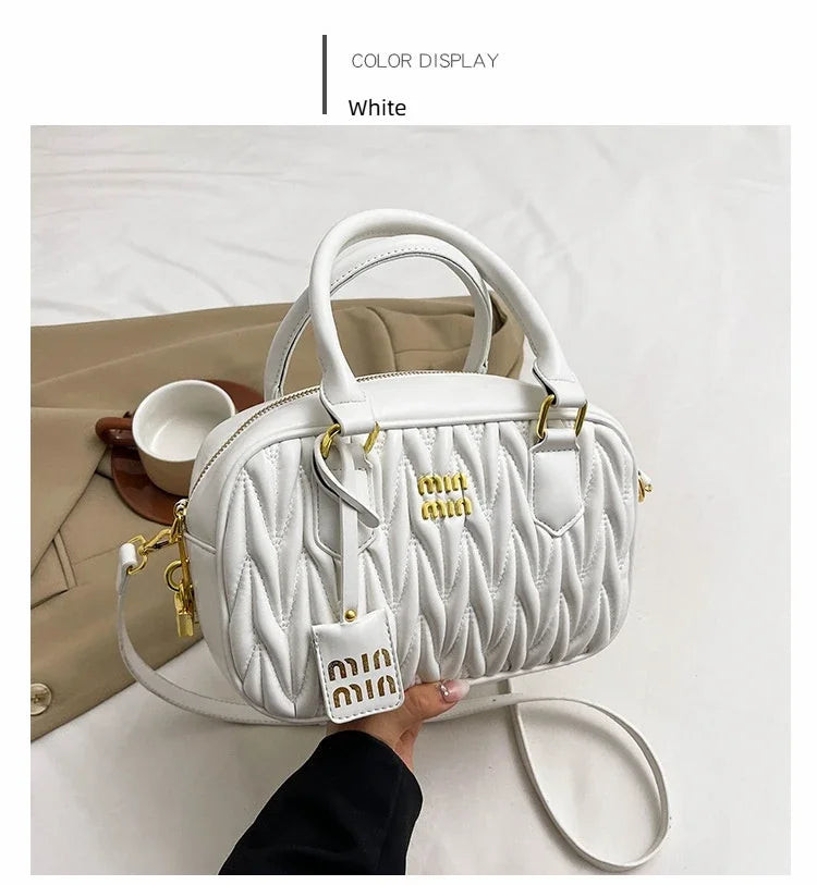 Stay stylish and organized with this new women's small square bag. With a versatile design that allows for multiple carrying options, this crossbody tote is perfect for daily use, providing both fashion and functionality in one chic accessory. -