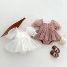Dress your toddler in sweet style with this new baby lace dress featuring a big bowknot and short sleeves—perfect for special occasions! -