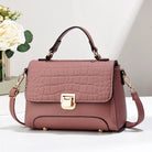 Carry all your essentials in style with this large capacity woman's handbag. Featuring both shoulder bag and crossbody options, this versatile accessory is perfect for everyday use and can accommodate your belongings with ease. -