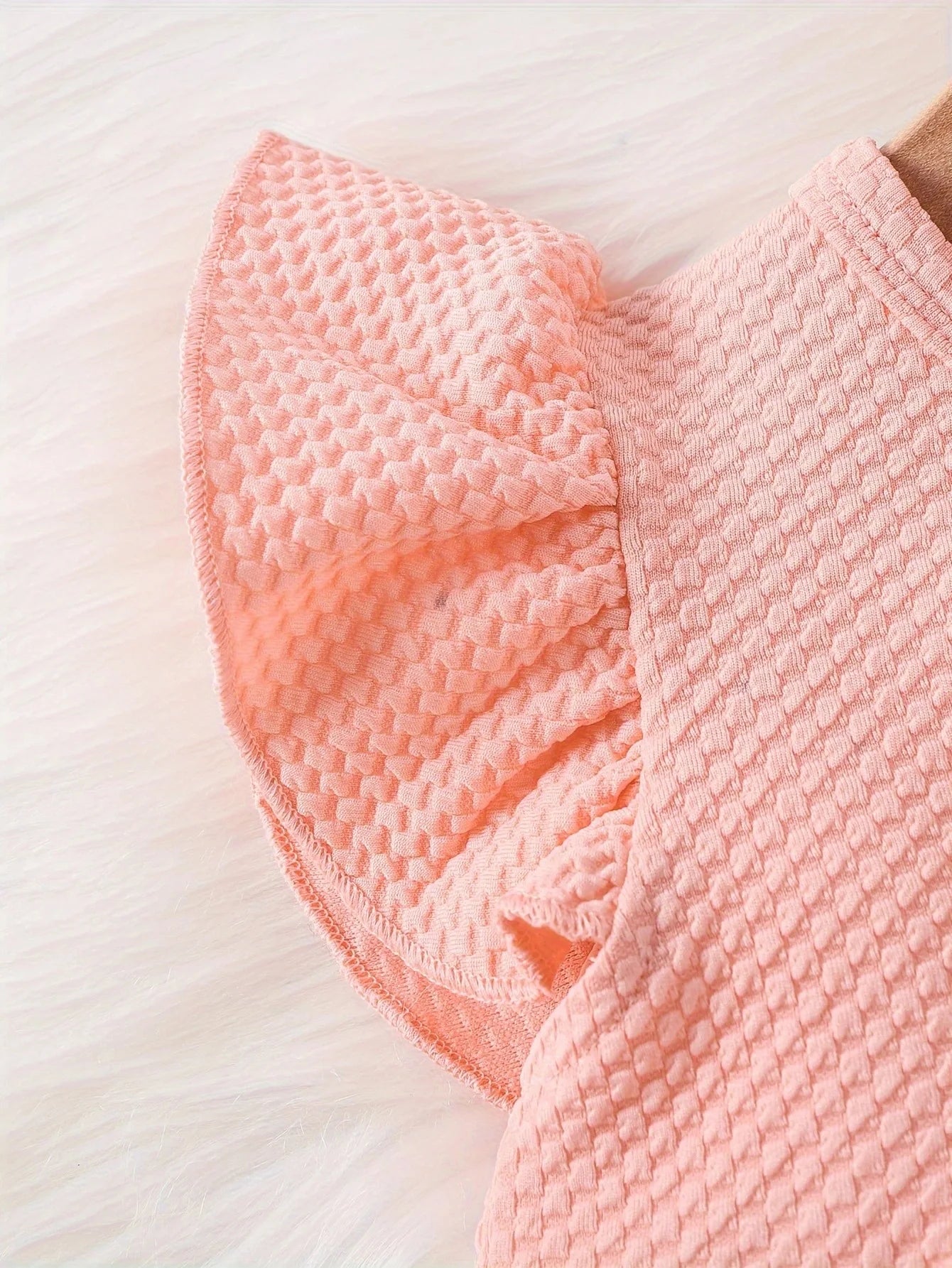 Dress your little princess in style with this pink waffle cardigan and embroidered dress set—perfect for ages 1-2 years and adding a cozy, elegant touch! -
