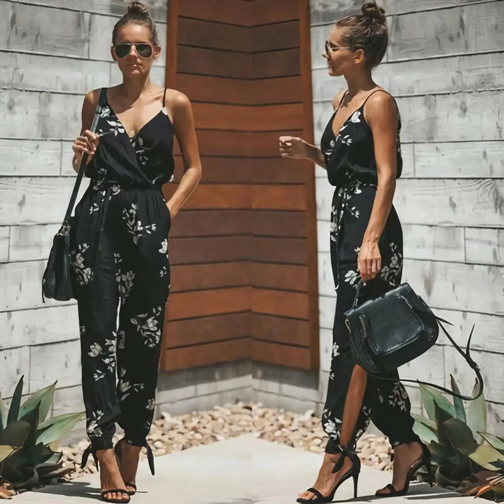 Dress to impress in this sexy and stylish women's summer jumpsuit. Featuring a backless design, deep V-neckline, floral print, and strappy details, this romper is perfect for making a statement with your outfit! -