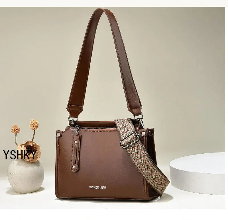 Elevate your style with this luxury designer crossbody bag for women, featuring a fashionable and chic color. Perfect for adding a touch of sophistication to your ensemble! -