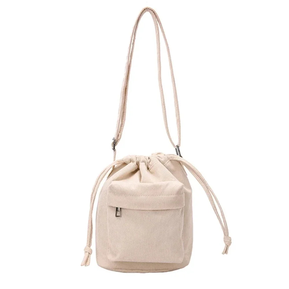 Carry your essentials in style with this cute middle shoulder drawstring bucket bag—a versatile and fashionable accessory for women on the go! -