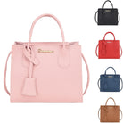 Carry your essentials in style with this versatile women's tote bag. Featuring a large capacity and made from casual PU leather, this crossbody handbag is perfect for adding a fashionable touch to your everyday look. -