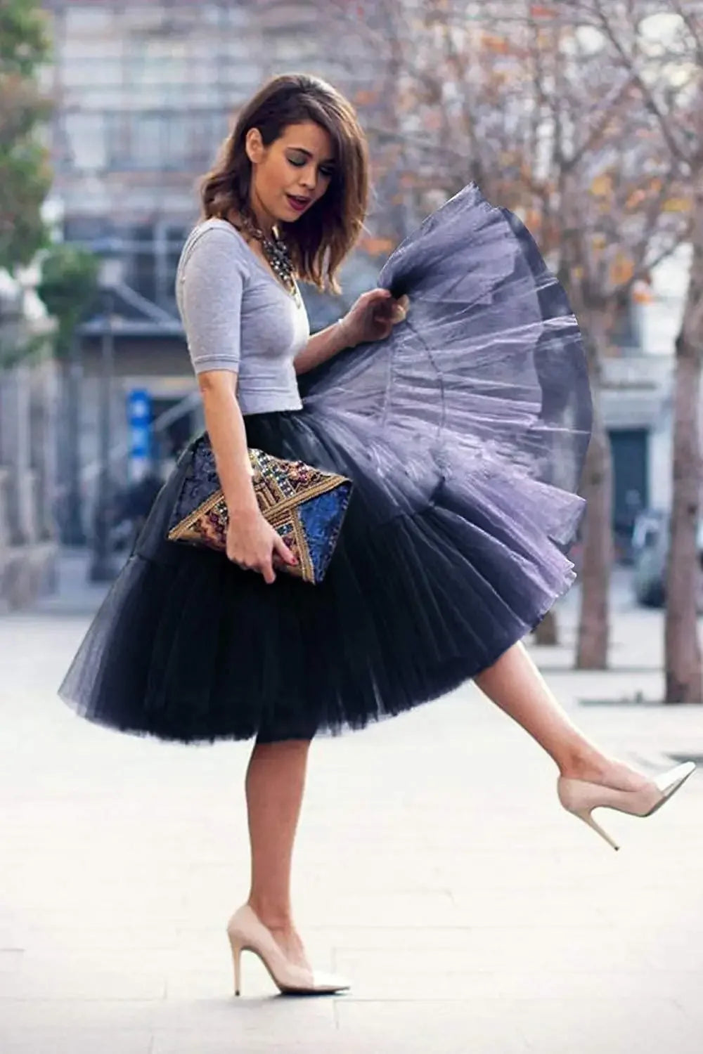 Add volume and elegance to your outfit with this knee-length underskirt—perfect for enhancing dresses and skirts for a fuller look! -