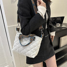 Elevate your style with these luxury designer shoulder crossbody bags for women. Featuring a quilted padded design from a top designer brand, these handbags are perfect for adding a touch of elegance to any outfit. -