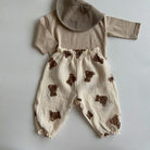 Keep your little ones comfy and cute in these organic cotton loose-fit baby pants—featuring playful tiger, bear, and floral prints perfect for boys and girls! -