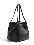 Stay on-trend with this bucket bag—a new fashion staple that offers simplicity, versatility, and a touch of classic style to elevate your wardrobe! -