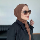 Experience effortless style and full coverage with this ready-to-wear instant hijab—featuring a secure fastener design, perfect for Muslim women seeking comfort and elegance! -