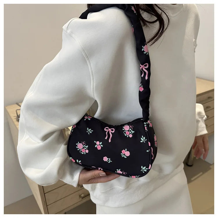 Stay stylish with these chic women's handbags made from nylon. Featuring a pleated design, these bags are perfect for the summer season, offering a trendy and functional accessory for your everyday outfits. -