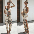 Dress to impress in this sexy and stylish women's summer jumpsuit. Featuring a backless design, deep V-neckline, floral print, and strappy details, this romper is perfect for making a statement with your outfit! -