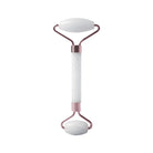 Enhance your skincare routine with this facial roller for the face, neck, and eyes. This resin massage tool can help improve circulation, reduce puffiness, and promote relaxation for a revitalized complexion. -
