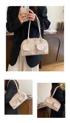 Accessorize stylishly with this black shoulder bag for women. This versatile handbag can be carried as a purse or a crossbody bag, making it a chic and practical choice for all occasions. -