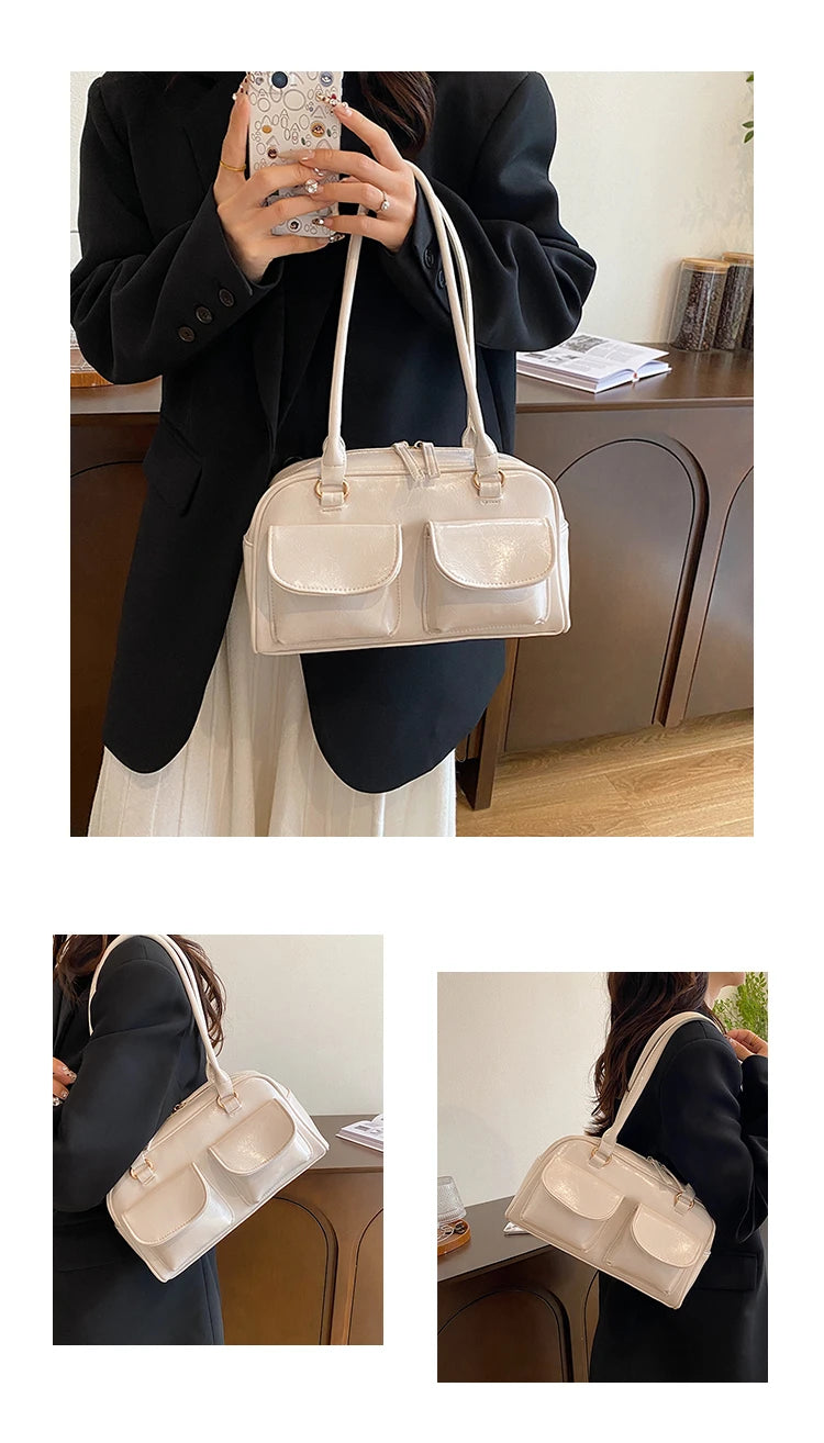 Accessorize stylishly with this black shoulder bag for women. This versatile handbag can be carried as a purse or a crossbody bag, making it a chic and practical choice for all occasions. -