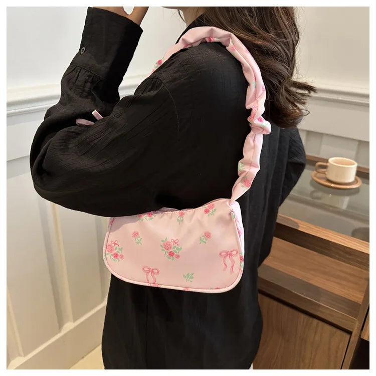 Stay stylish with these chic women's handbags made from nylon. Featuring a pleated design, these bags are perfect for the summer season, offering a trendy and functional accessory for your everyday outfits. -