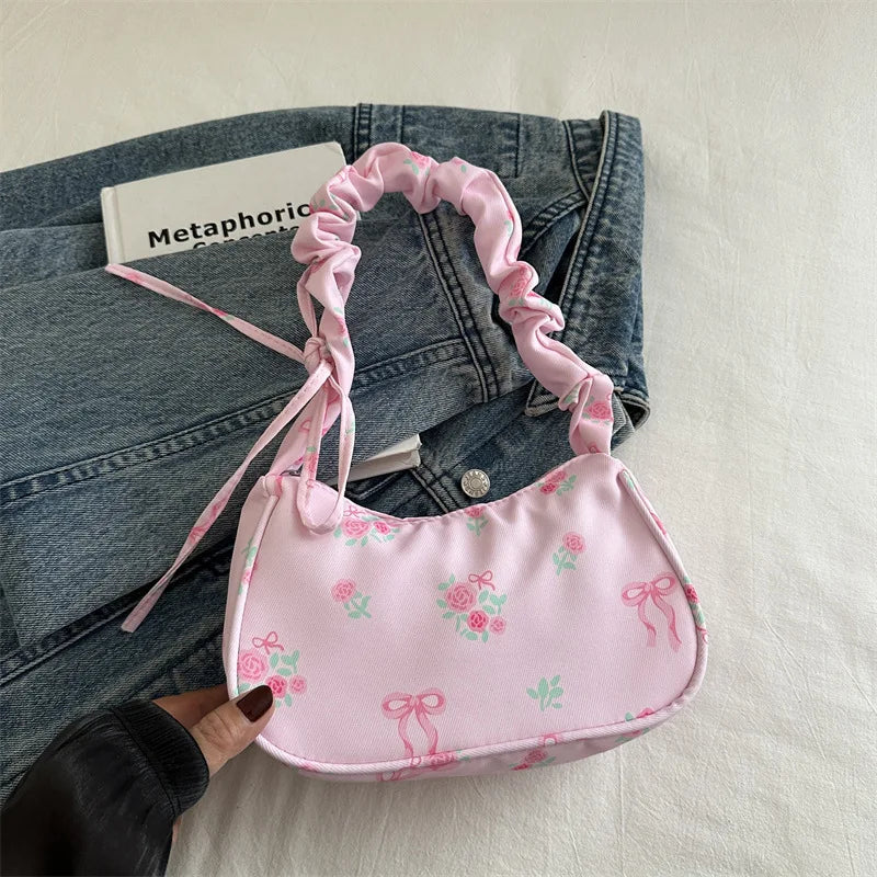 Stay stylish with these chic women's handbags made from nylon. Featuring a pleated design, these bags are perfect for the summer season, offering a trendy and functional accessory for your everyday outfits. -