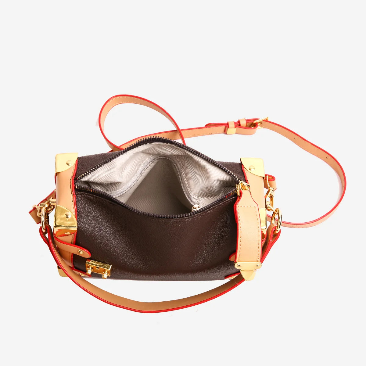 Make a statement with this luxurious and elegant box bag for women. Crafted from high-quality leather, this shoulder handbag features an elegant top-handle design, exuding sophistication and style for a classy finishing touch to your ensemble. -