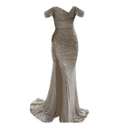 Dazzle in style with this sequin pleated maxi dress featuring short sleeves and a waist-tight silhouette—perfect for showcasing sophistication and glamour! -