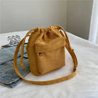 Carry your essentials in style with this cute middle shoulder drawstring bucket bag—a versatile and fashionable accessory for women on the go! -