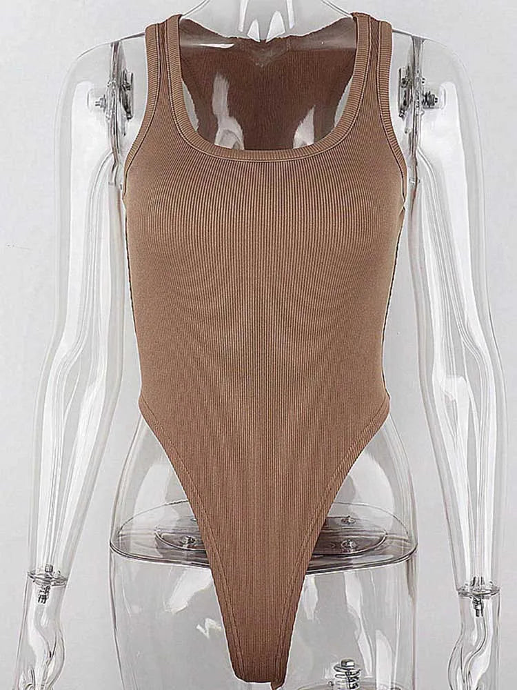 Achieve a hot and sexy look with this sleeveless knit bodysuit featuring an off-shoulder halter design. Perfect for making a stylish and alluring statement! -