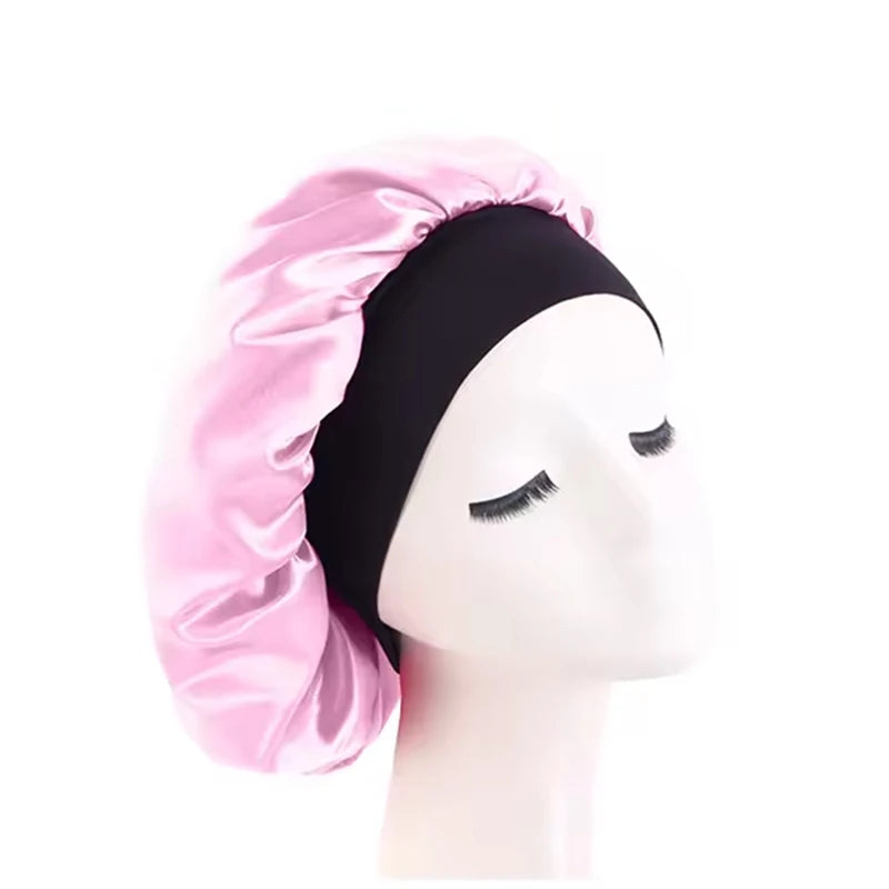 Protect your hair in style with these satin solid bonnets. Featuring a wide-brim design, these hats are perfect for night sleeping or bathing and are suitable for both men and women. -