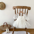 Dress your toddler in sweet style with this new baby lace dress featuring a big bowknot and short sleeves—perfect for special occasions! -