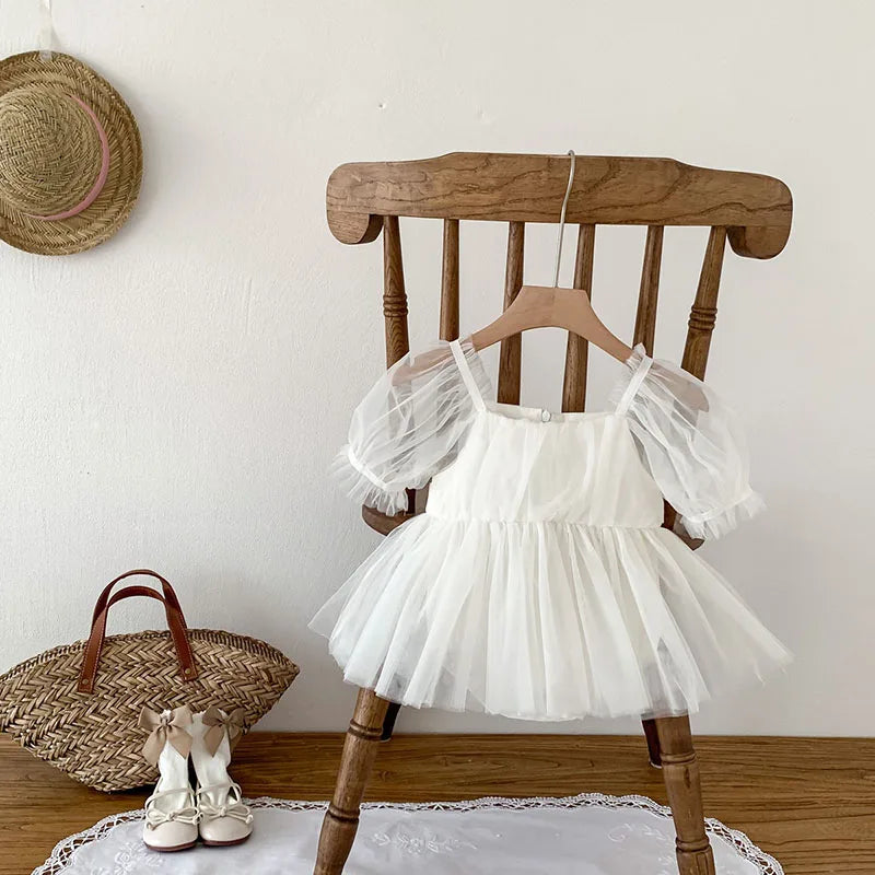 Dress your toddler in sweet style with this new baby lace dress featuring a big bowknot and short sleeves—perfect for special occasions! -