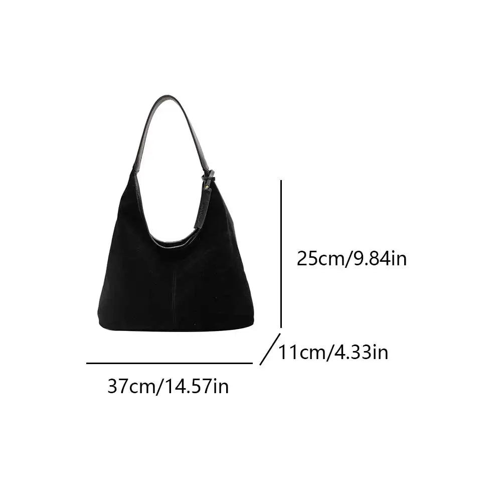 Elevate your style with this vintage shoulder bag, featuring a solid color design and large capacity. Perfect for the autumn-winter season, this handbag offers both fashion and functionality for your everyday essentials. -