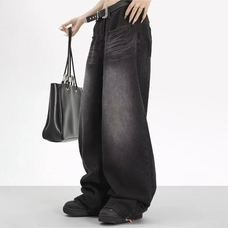 Rock a vintage vibe with these oversized retro black wide-leg jeans for women! -