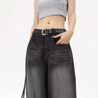Rock a vintage vibe with these oversized retro black wide-leg jeans for women! -