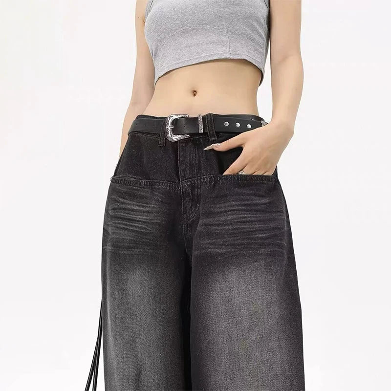 Rock a vintage vibe with these oversized retro black wide-leg jeans for women! -