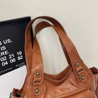 Make a statement with these luxurious handbags for women, crafted from leather and designed to be worn as shoulder bags. Elevate your style with these sac de luxe femme accessories, perfect for a chic and sophisticated look! -