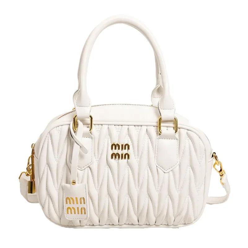 Stay stylish and organized with this new women's small square bag. With a versatile design that allows for multiple carrying options, this crossbody tote is perfect for daily use, providing both fashion and functionality in one chic accessory. -