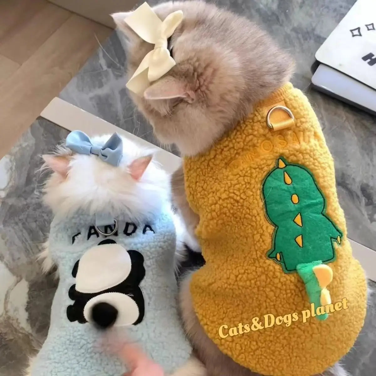 Keep your small and medium-sized dogs, as well as cats, stylish in these adorable pet clothes—perfect for adding flair to your furry friends' wardrobes! -