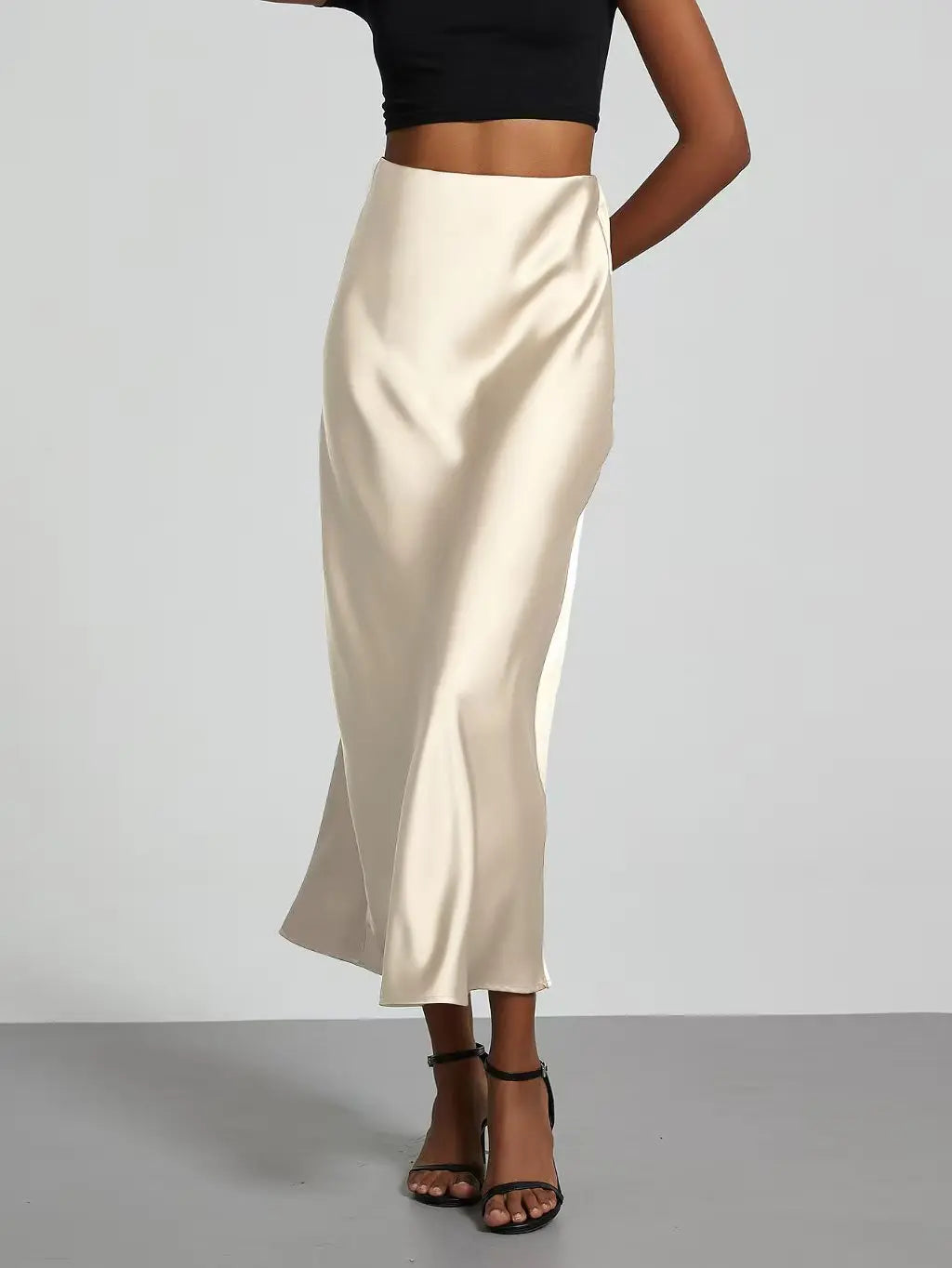 Elevate your elegance with this sleek black satin skirt for women—perfect for any occasion! -